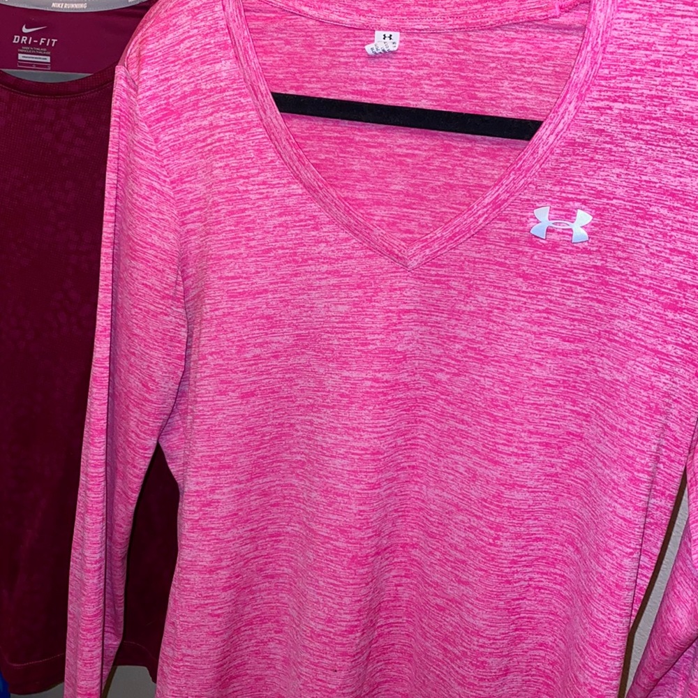 Under Armour pink athletic top.